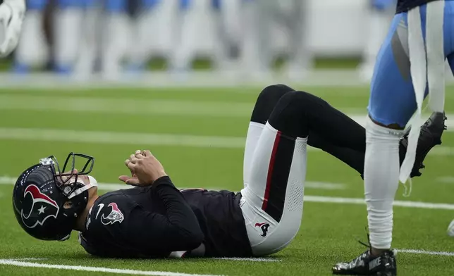 Houston Texans place-kicker Ka'imi Fairbairn reacts after missing a field goal attempt during the second half an NFL football game against the Tennessee Titans, Sunday, Nov. 24, 2024, in Houston. (AP Photo/Ashley Landis)