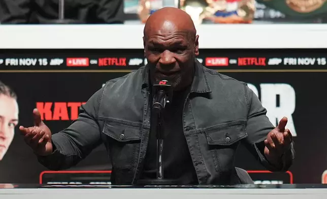 Mike Tyson speaks during a news conference ahead of his fight against Jake Paul, Wednesday, Nov. 13, 2024, in Irving, Texas. (AP Photo/Julio Cortez)