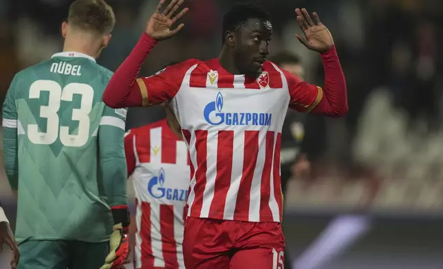 Red Star's Silas, right, celebrates after scoring his side's first goal during the Champions League opening phase soccer match between Red Star and Stuttgart at the Rajko Mitic Stadium in Belgrade, Serbia, Wednesday, Nov. 27, 2024. (AP Photo/Darko Vojinovic)