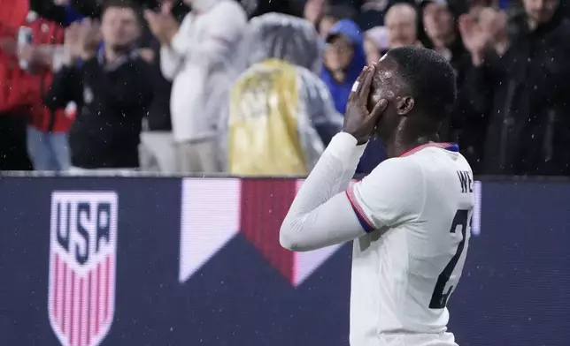 United States' Tim Weah celebrates after scoring during the second half in a CONCACAF Nations League quarterfinal second leg soccer match against Jamaica Monday, Nov. 18, 2024, in St. Louis. (AP Photo/Jeff Roberson)