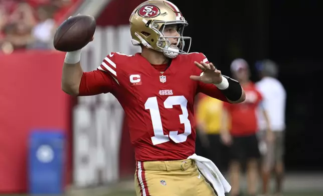 San Francisco 49ers quarterback Brock Purdy (13) passes against the Tampa Bay Buccaneers during the first half of an NFL football game in Tampa, Fla., Sunday, Nov. 10, 2024. (AP Photo/Jason Behnken)