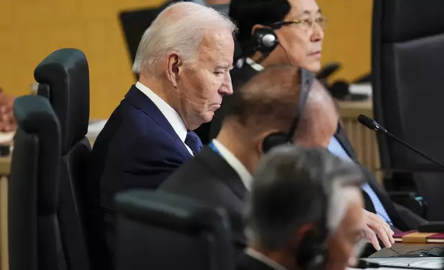 U.S. President Joe Biden attends the APEC Leaders' Informal Dialogue at the APEC Summit in Lima, Peru, Friday, Nov. 15, 2024. (Sean Kilpatrick/The Canadian Press via AP)