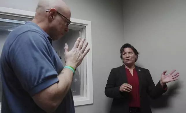 Border Patrol specialist Mitchell Holmes listens to instructor and chaplain Myrna Gonzalez during a training session, Wednesday, Nov. 20, 2024, in Dania Beach, Fla. (AP Photo/Marta Lavandier)