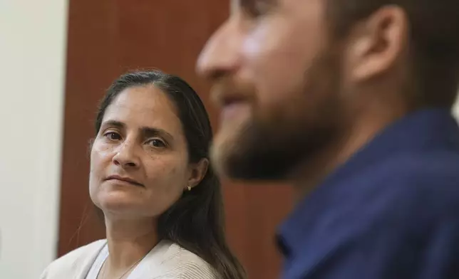 Border Patrol processing coordinator Yaira Santiago listens to Federal Wildlife officer Cody Smith during a scenario training session, Wednesday, Nov. 20, 2024, in Dania Beach, Fla. (AP Photo/Marta Lavandier)