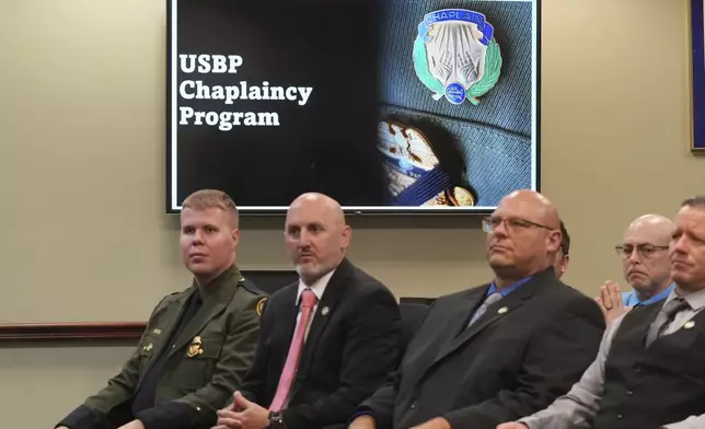 The USBP chaplaincy program class listen to remarks during their graduation, Thursday, Nov. 21, 2024, in Dania Beach, Fla. (AP Photo/Marta Lavandier)