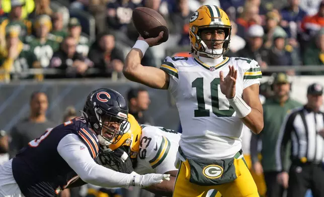 Green Bay Packers' Jordan Love throws a pass during the second half of an NFL football game against the Chicago Bears Sunday, Nov. 17, 2024, in Chicago. (AP Photo/Nam Y. Huh)