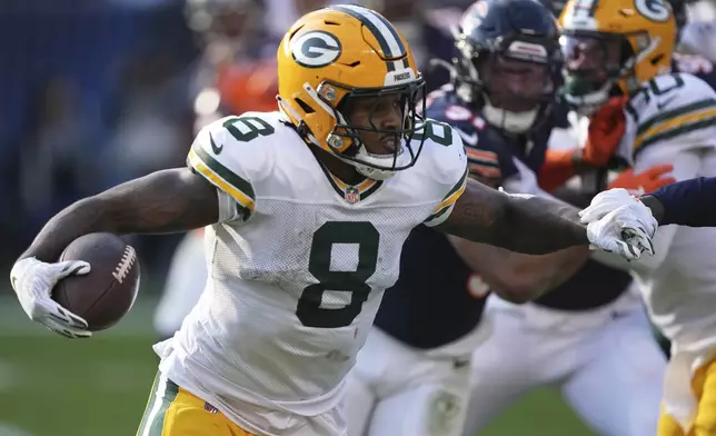 Green Bay Packers' Josh Jacobs runs during the second half of an NFL football game against the Chicago Bears Sunday, Nov. 17, 2024, in Chicago. (AP Photo/Charles Rex Arbogast)