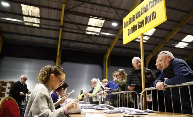 Counting begins for Ireland's General Election at the Royal Dublin Society in Dublin, Ireland, Saturday, Nov. 30, 2024. (AP Photo/Peter Morrison)