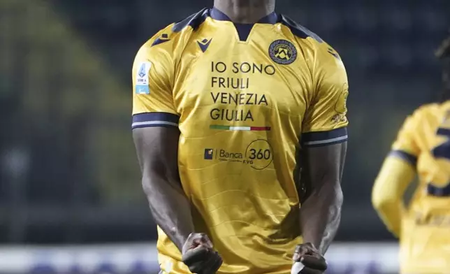 Udinese's Keinan Davis celebrates after scoring during the Serie A soccer match between Empoli and Udinese at the Carlo Castellani Stadium in Empoli, Italy, Monday, Nov. 25, 2024. (Marco Bucco/LaPresse via AP)