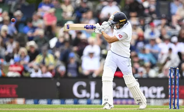 England's Jacob Bethell bats during play on the second day of the first cricket test between England and New Zealand at Hagley Oval in Christchurch, New Zealand, Friday, Nov. 29, 2024. (Andrew Cornaga/Photosport via AP)