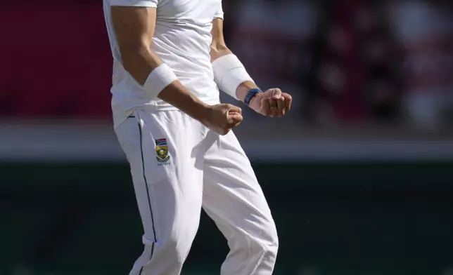 South Africa's Gerald Coetzee celebrates after successfully appealing for LBW against Sri Lanka's Pathum Nissanka for 29 runs during the third day of the first Test cricket match between South Africa and Sri Lanka, at Kingsmead stadium in Durban, South Africa, Friday, Nov. 29, 2024. (AP Photo/Themba Hadebe)