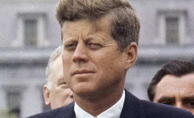 FILE - President John F. Kennedy listens while Grand Duchess Charlotte of Luxembourg speaks outside the White House, April 30, 1963, in Washington. (AP Photo/William J. Smith, File)