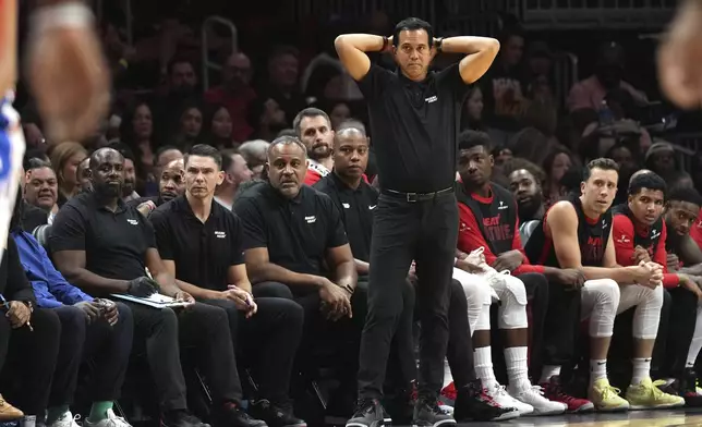 Miami Heat head coach Erik Spoelstra watches during the first half of an NBA basketball game against the Philadelphia 76ers, Monday, Nov. 18, 2024, in Miami. (AP Photo/Lynne Sladky)