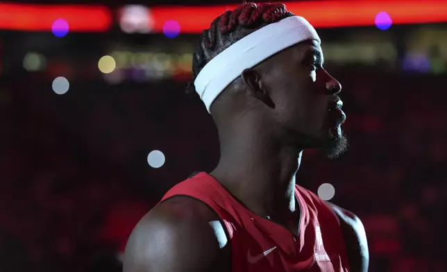 Miami Heat forward Jimmy Butler is introduced before an NBA basketball game against the Philadelphia 76ers, Monday, Nov. 18, 2024, in Miami. (AP Photo/Lynne Sladky)