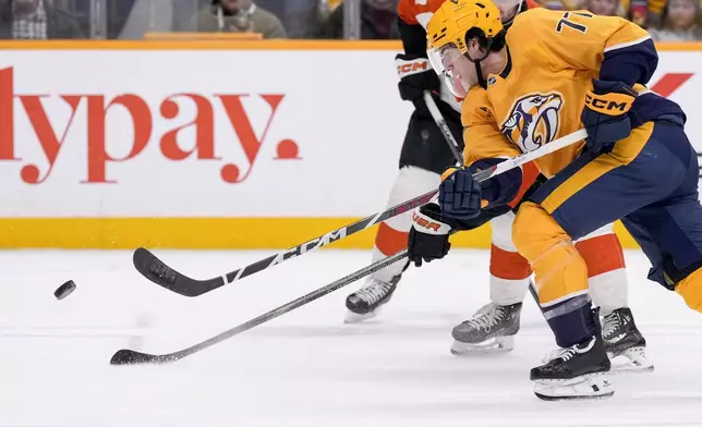 during the second period of an NHL hockey game Wednesday, Nov. 27, 2024, in Nashville, Tenn. (AP Photo/George Walker IV)