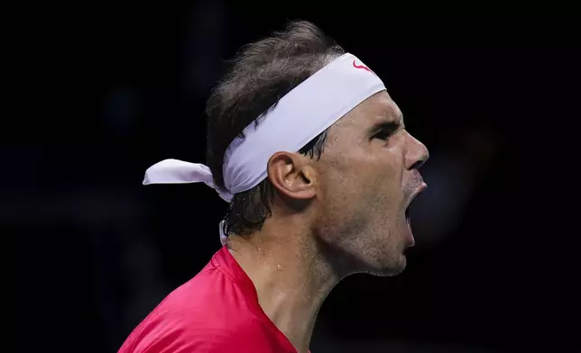 Spain's tennis player Rafael Nadal reacts during a Davis Cup quarterfinal match against Netherlands' Botic Van De Zandschulp at Martin Carpena Sports Hall in Malaga, southern Spain, on Tuesday, Nov. 19, 2024. (AP Photo/Manu Fernandez)