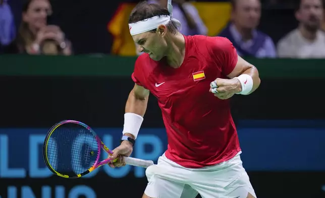 Spain's tennis player Rafael Nadal reacts during a Davis Cup quarterfinal match against Netherlands' Botic Van De Zandschulp at Martin Carpena Sports Hall in Malaga, southern Spain, on Tuesday, Nov. 19, 2024. (AP Photo/Manu Fernandez)