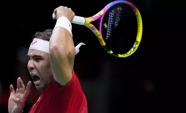 Spain's tennis player Rafael Nadal competes against Netherlands' Botic Van De Zandschulp during a Davis Cup quarterfinal match at Martin Carpena Sports Hall in Malaga, southern Spain, on Tuesday, Nov. 19, 2024. (AP Photo/Manu Fernandez)