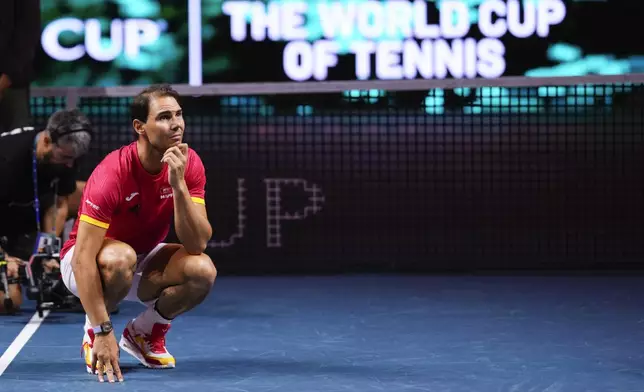 Spain's Rafael Nadal during a tribute after playing his last match as a professional tennis player in the Davis Cup quarterfinals at the Martin Carpena Sports Hall in Malaga, southern Spain, on early Wednesday, Nov. 20, 2024. (AP Photo/Manu Fernandez)