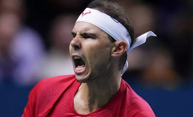 Spain's tennis player Rafael Nadal reacts during a Davis Cup quarterfinal match against Netherlands' Botic Van De Zandschulp at Martin Carpena Sports Hall in Malaga, southern Spain, on Tuesday, Nov. 19, 2024. (AP Photo/Manu Fernandez)