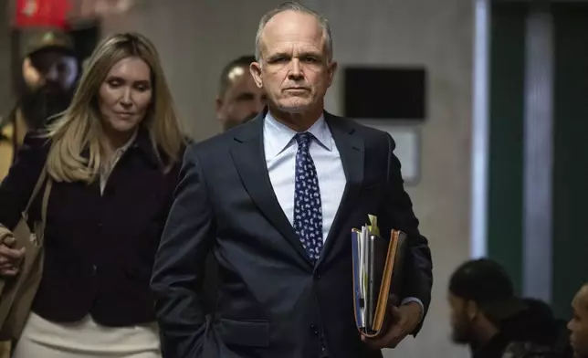 Steve Bannon's attorney John Carman arrives at court in New York, Tuesday, Nov. 12, 2024. (AP Photo/Yuki Iwamura)