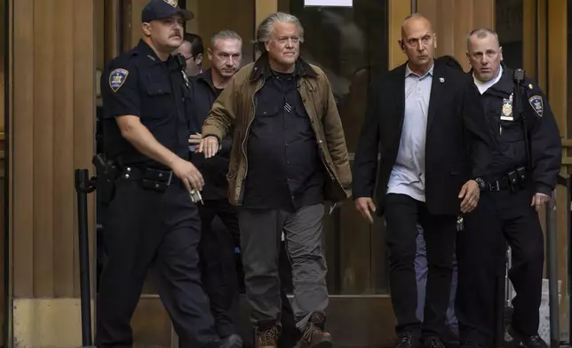 Steve Bannon exits Manhattan criminal court in New York, Tuesday, Nov. 12, 2024. (AP Photo/Yuki Iwamura)