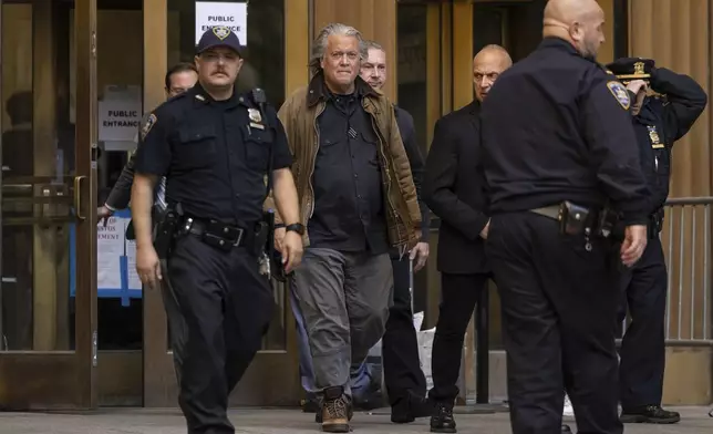 Steve Bannon exits Manhattan criminal court in New York, Tuesday, Nov. 12, 2024. (AP Photo/Yuki Iwamura)