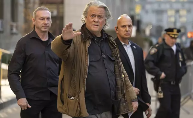 Steve Bannon exits Manhattan criminal court in New York, Tuesday, Nov. 12, 2024. (AP Photo/Yuki Iwamura)