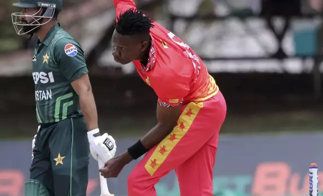 Zimbabwe's Blessing Muzarabani bowls during the second ODI cricket match between Zimbabwe and Pakistan at Queens Sports Club in Bulawayo, Zimbabwe, Tuesday, Nov. 26, 2024. (AP Photo/Wonder Mashura)