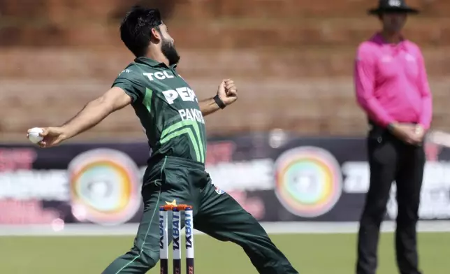 Pakistan's Aamer Jamal bowls during during the second ODI cricket match between Zimbabwe and Pakistan at Queens Sports Club in Bulawayo, Zimbabwe, Tuesday, Nov. 26, 2024. (AP Photo/Wonder Mashura)