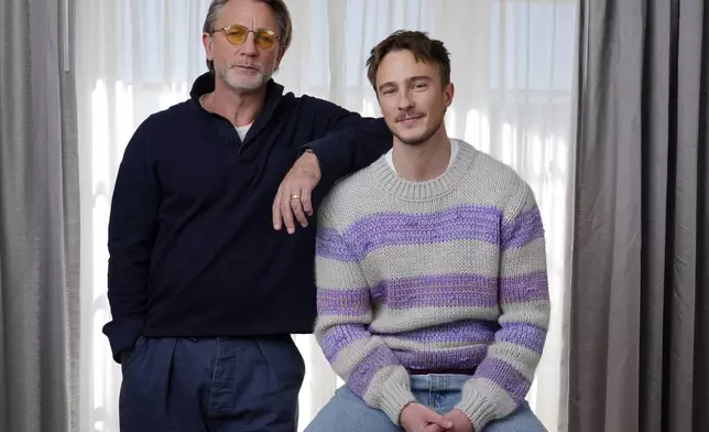 Daniel Craig, left, and Drew Starkey, cast members in the film "Queer," pose together for a portrait to promote the film on Wednesday, Nov. 13, 2024 in Los Angeles. (AP Photo/Chris Pizzello)