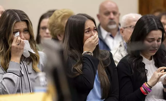 From left, Connolly Huth, Lauren Phillips and Sofia Magana become emotional during the trial for Jose Ibarra at the Athens-Clarke County Superior Court on Tuesday, Nov. 19, 2024, in Athens, Ga. (Arvin Temkar/Atlanta Journal-Constitution via AP, Pool)