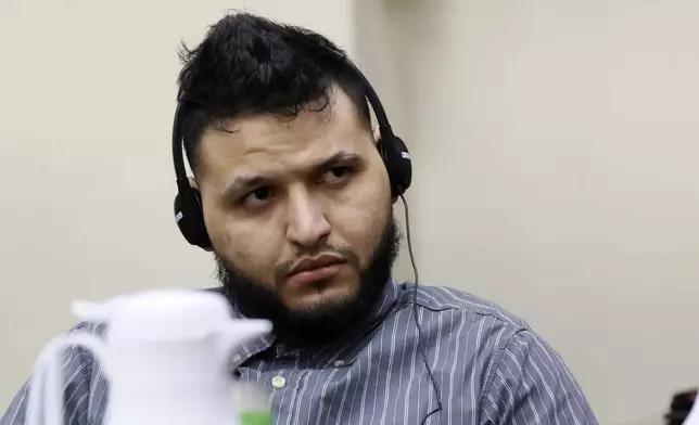 Jose Ibarra pays attention to a witness during his trial at the Athens-Clarke County Superior Court on Monday, Nov. 18, 2024, in Athens, Ga. (Miguel Martinez/Atlanta Journal-Constitution via AP, Pool)