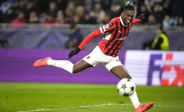 AC Milan's Rafael Leao scores the second goal against Slovan Bratislava during the Champions League opening phase soccer match between Slovan Bratislava and AC Milan in Bratislava, Slovakia, on Tuesday, Nov. 26, 2024. (AP Photo/Petr David Josek)