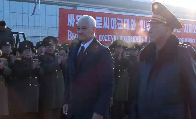 In this photo taken from a video released by Russian Defense Ministry press service, Russian Defense Minister Andrei Belousov, left, is welcomed by North Korean Defense Minister No Kwang Chol upon his arrival at Pyongyang International Airport outside of Pyongyang, North Korea Friday, Nov. 29, 2024. (Russian Defense Press Service via AP)