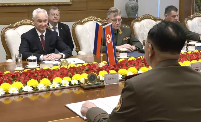 In this photo taken from a video released by Russian Defense Ministry press service, Russian Defense Minister Andrei Belousov, left, speaks with North Korean Defense Minister No Kwang Chol, unseen, during their meeting in Pyongyang, North Korea Friday, Nov. 29, 2024. (Russian Defense Ministry Press Service via AP)