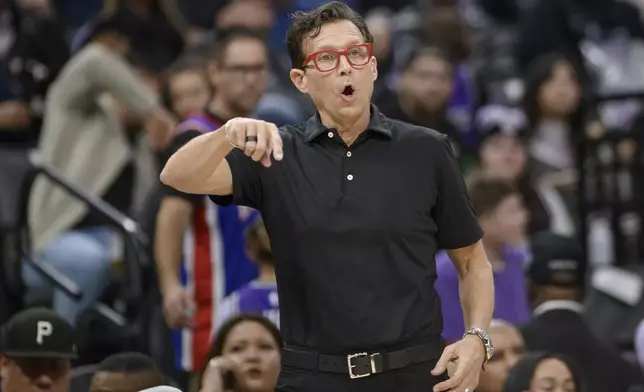 Atlanta Hawks head coach Quin Snyder shouts instructions from the sideline during the first half of an NBA basketball game against the Sacramento Kings in Sacramento, Calif., Monday, Nov. 18, 2024. (AP Photo/Randall Benton)