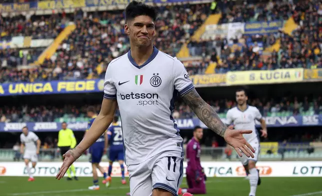 Inter Milan's Joaquin Correa celebrates scoring during the Serie A soccer match between Hellas Verona and Inter Milan at the Marcantonio Bentegodi Stadium, in Verona, Italy, Saturday, Nov. 23, 2024. (Paola Garbuio/LaPresse via AP)