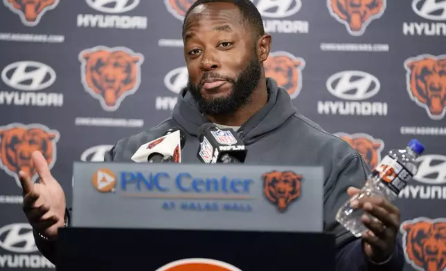 Chicago Bears new offensive coordinator Thomas Brown reacts as he listens to reporters during an NFL football news conference at Halas Hall in Lake Forest, Ill., Wednesday, Nov. 13, 2024. (AP Photo/Nam Y. Huh)