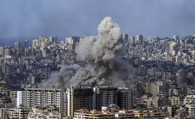 Smoke rises after an Israeli airstrike on Dahiyeh, in the southern suburb of Beirut, Lebanon, Thursday, Nov. 21, 2024. (AP Photo/Bilal Hussein)