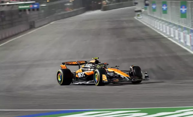 McLaren driver Lando Norris, of Britain, drives the course during a practice session for the Formula One U.S. Grand Prix auto race, Thursday, Nov. 21, 2024, in Las Vegas. (AP Photo/Matt York)