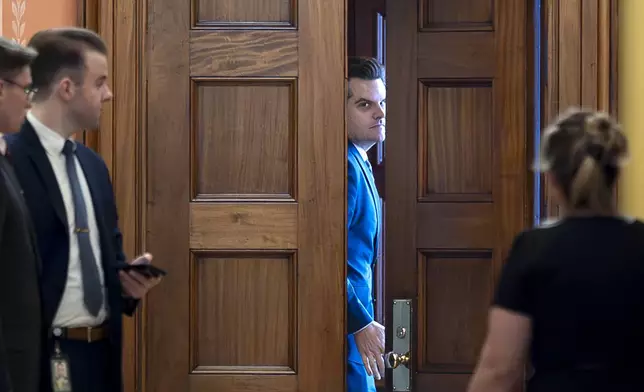 President-elect Donald Trump's nominee to be attorney general, former Rep. Matt Gaetz, R-Fla., closes a door to a private meeting with Vice President-elect JD Vance and Republican Senate Judiciary Committee members, at the Capitol in Washington, Wednesday, Nov. 20, 2024. (AP Photo/J. Scott Applewhite)