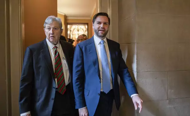 Vice President-elect JD Vance, right, and Sen. John Kennedy, R-La., left, walk out of a meeting with President-elect Donald Trump's nominee to be attorney general, former Rep. Matt Gaetz, R-Fla., and Republican Senate Judiciary Committee members, at the Capitol in Washington, Wednesday, Nov. 20, 2024. (AP Photo/Ben Curtis)