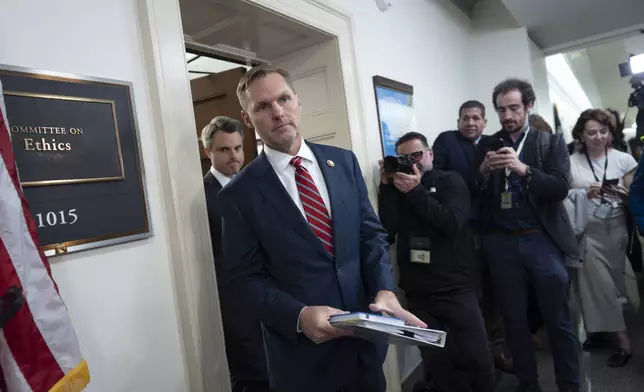 House Ethics Committee Chairman Michael Guest, R-Miss., rushes past reporters without speaking after his panel met to consider the investigation of former Rep. Matt Gaetz, R-Fla., President-elect Donald Trump's choice to be attorney general, at the Capitol in Washington, Wednesday, Nov. 20, 2024. (AP Photo/J. Scott Applewhite)