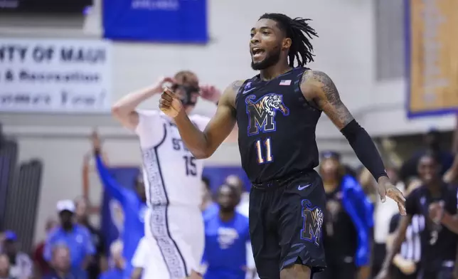 Memphis guard Tyrese Hunter (11) reacts to scoring against Michigan State during the second half of an NCAA college basketball game at the Maui Invitational Tuesday, Nov. 26, 2024, in Lahaina, Hawaii. Memphis won 71-63. (AP Photo/Lindsey Wasson)