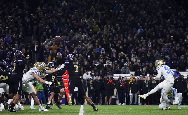 UCLA place kicker Mateen Bhaghani kicks a field goal against Washington during the first half of an NCAA college football game Friday, Nov. 15, 2024, in Seattle. (AP Photo/Lindsey Wasson)