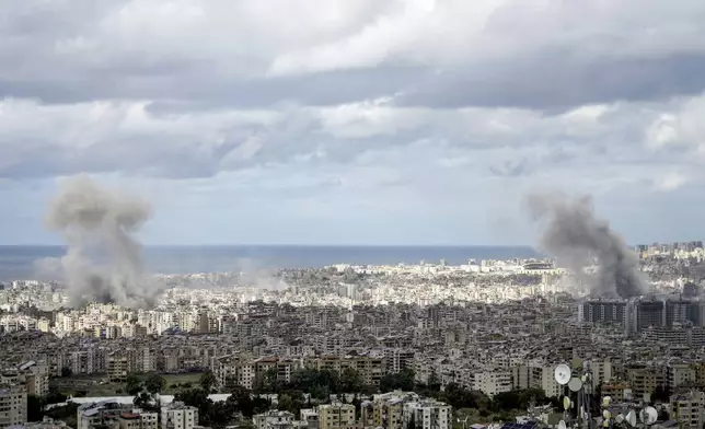 Smoke rises after an Israeli airstrike on Dahiyeh, in the southern suburb of Beirut, Lebanon, Monday, Nov. 25, 2024. (AP Photo/Bilal Hussein)