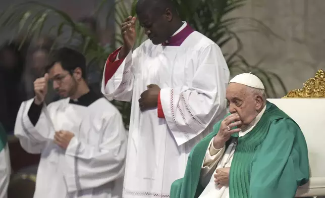 Pope Francis presides over a mass on the occasion of the World Day of the Poor in St. Peter's Basilica, at the Vatican, Sunday, Nov. 17, 2024. (AP Photo/Alessandra Tarantino)