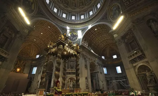 A view of St. Peter's Basilica as Pope Francis presides over a mass on the occasion of the World Day of the Poor, at the Vatican, Sunday, Nov. 17, 2024. (AP Photo/Alessandra Tarantino)