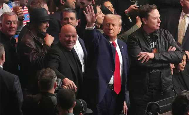 President-elect Donald Trump attends UFC 309 at Madison Square Garden, Saturday, Nov. 16, 2024, in New York, with Kid Rock, Dana White and Elon Musk. (AP Photo/Evan Vucci)